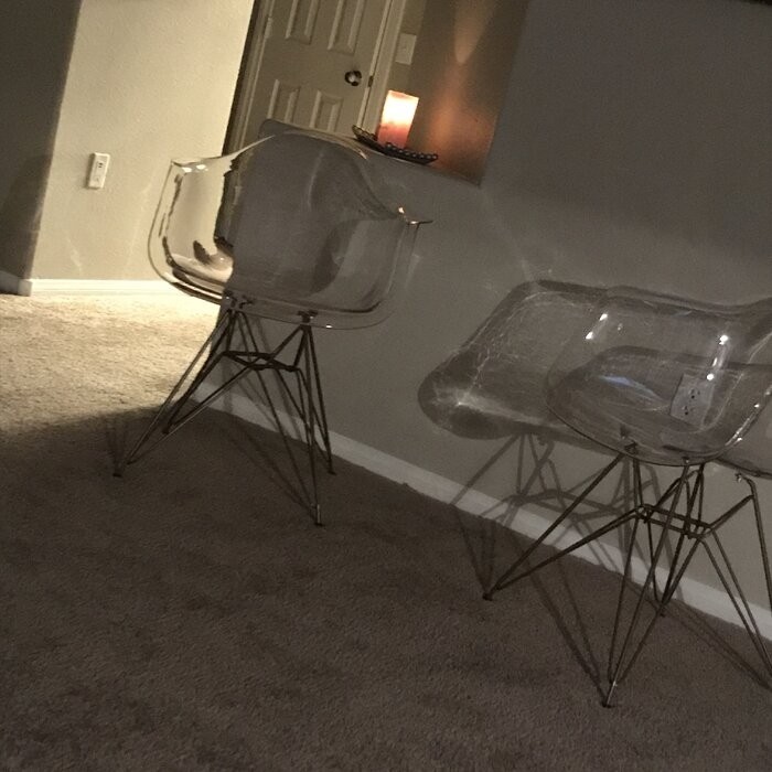 Nunley Stacking Arm Chair in Clear
