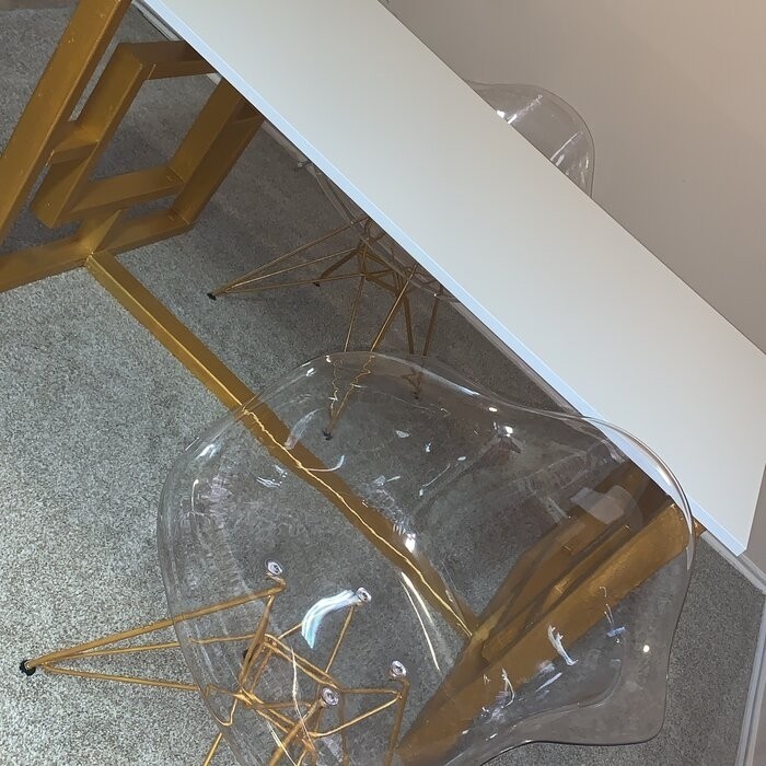 Nunley Stacking Arm Chair in Clear