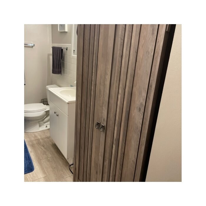 Pernell 31'' W x 16'' D Free-Standing Bathroom Cabinet