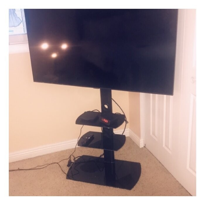 Randal Symple Stuff Black Swivel Floor Stand Mount for Screens with Shelving, Holds up to 110 Lb. lbs