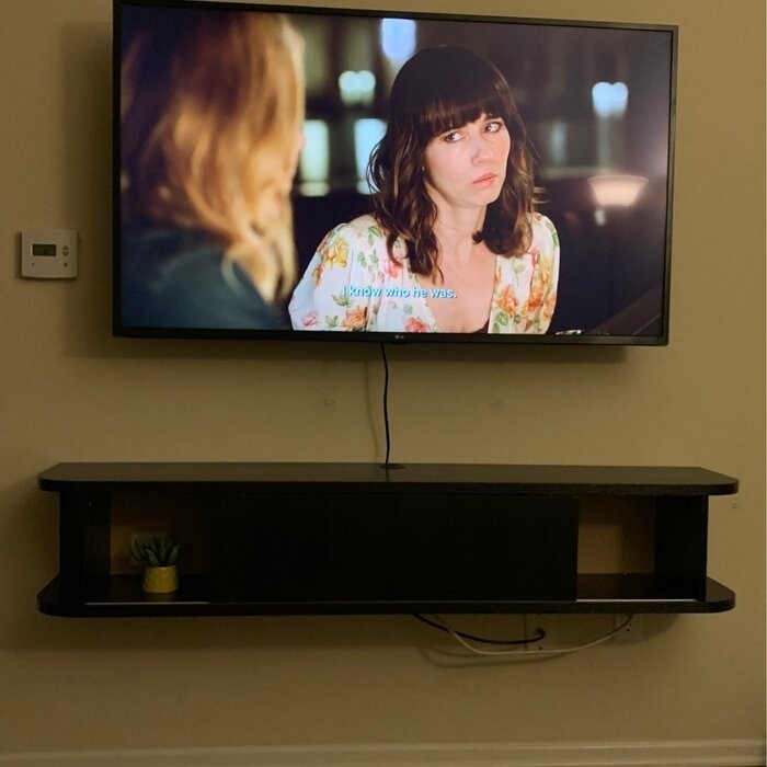Winkleman Floating TV Stand for TVs up to 70"