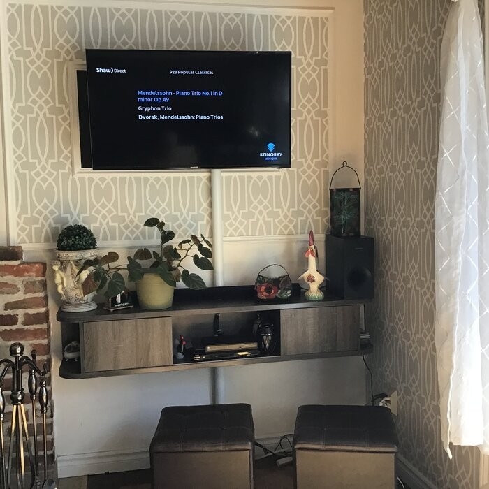 Winkleman Floating TV Stand for TVs up to 70"