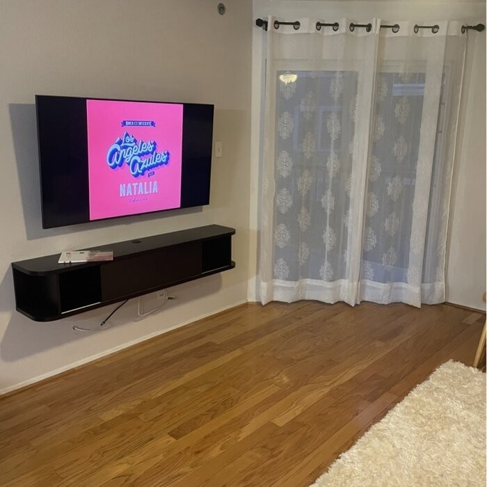 Winkleman Floating TV Stand for TVs up to 70"