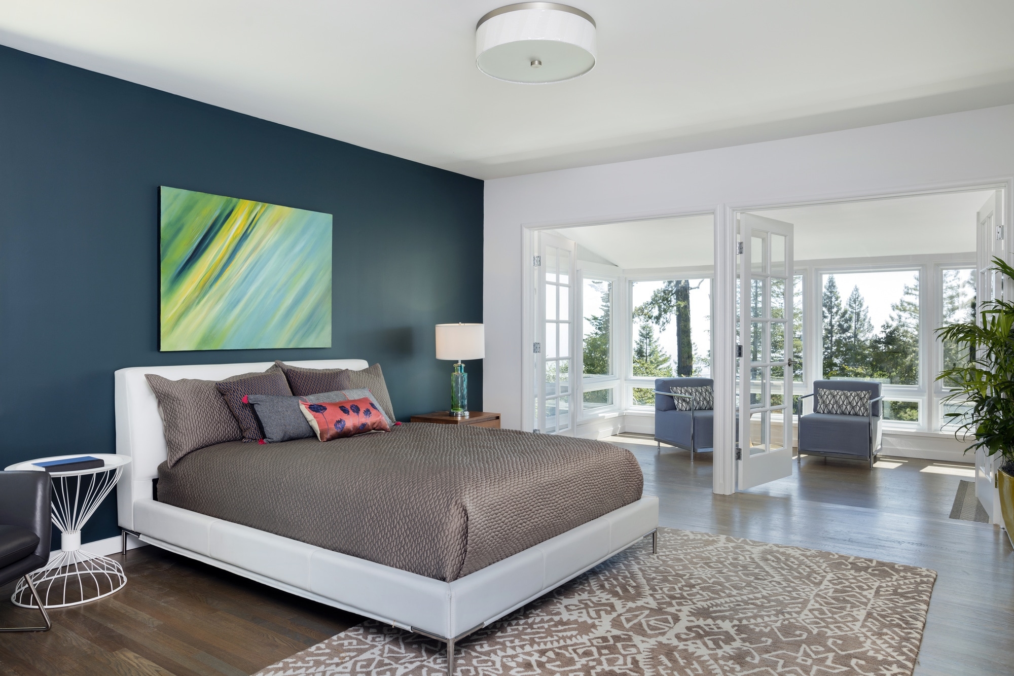 Bedroom Using Dark Green-Blue Accent Wall