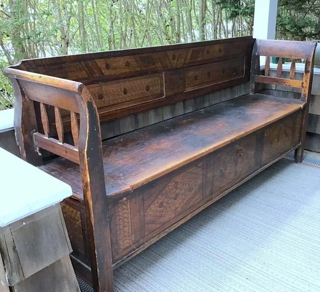 Carved oak antique bench with storage