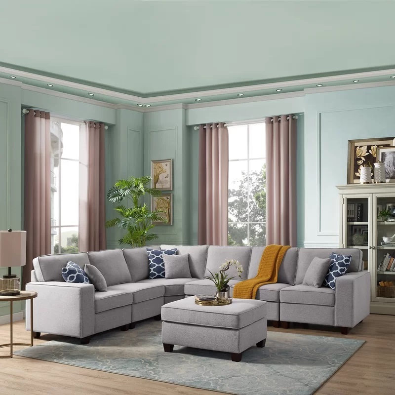 Classic light gray sectional with ottoman