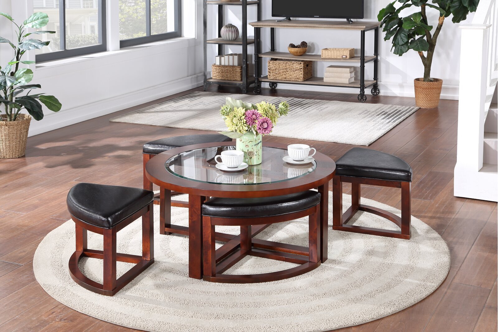 Coffee table with nesting stools for 4