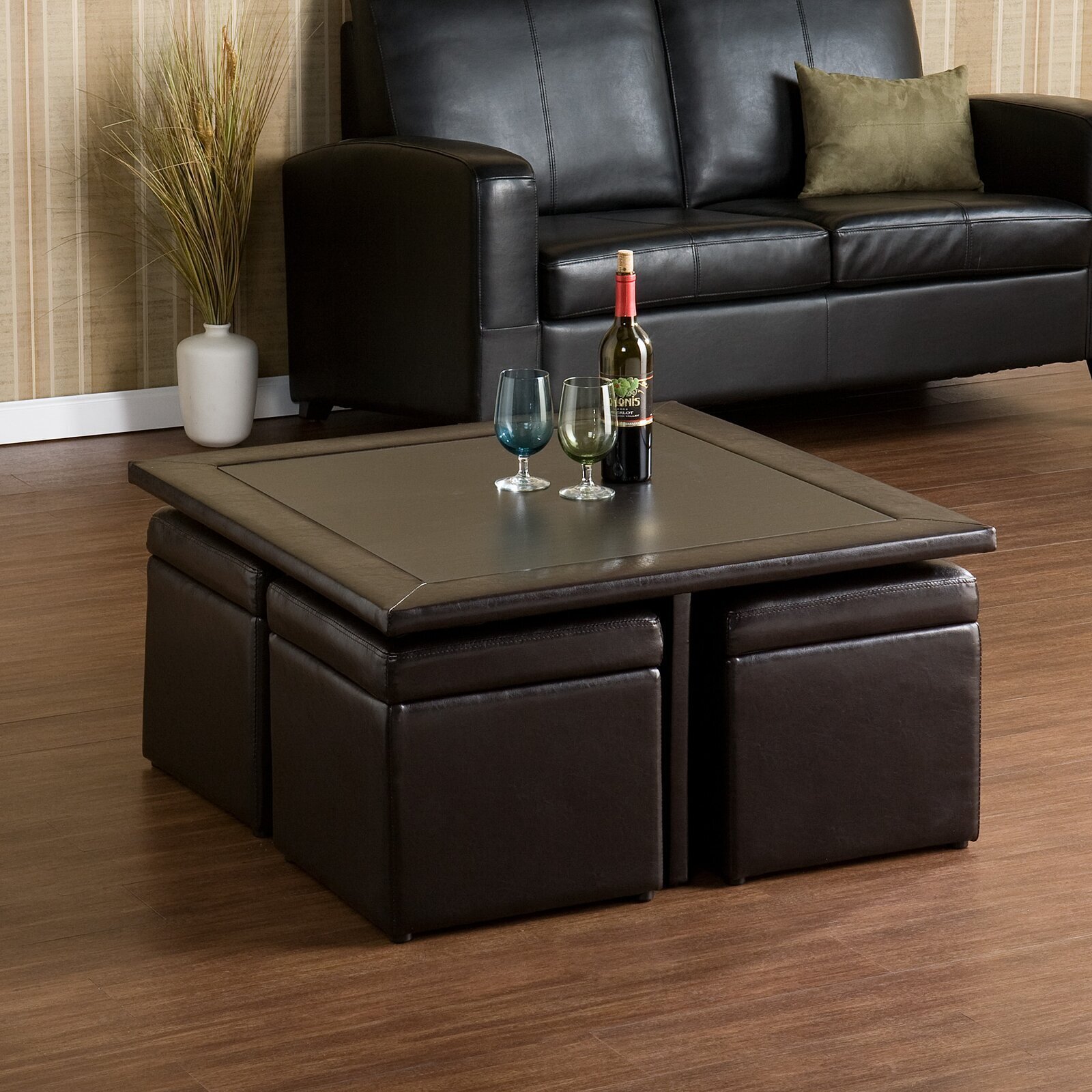 Compact nesting coffee table with stools