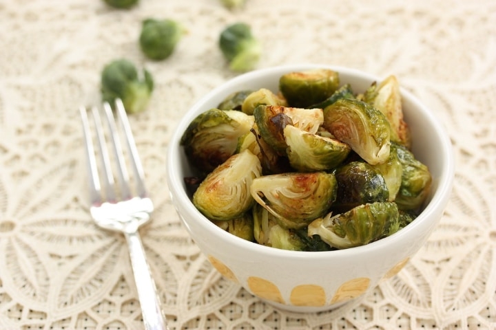 eating brussel sprouts with fork eating brussel sprouts with fork