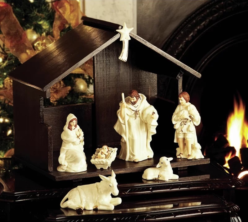 Eight piece wood and ceramic nativity set