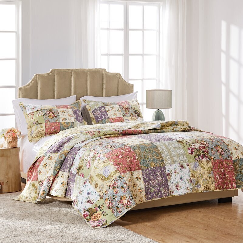 Floral patchwork quilt with vintage flair