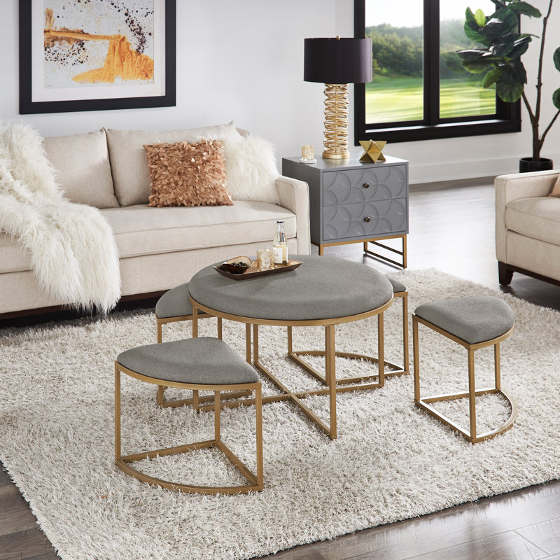 Gray and gold fabric nested coffee table