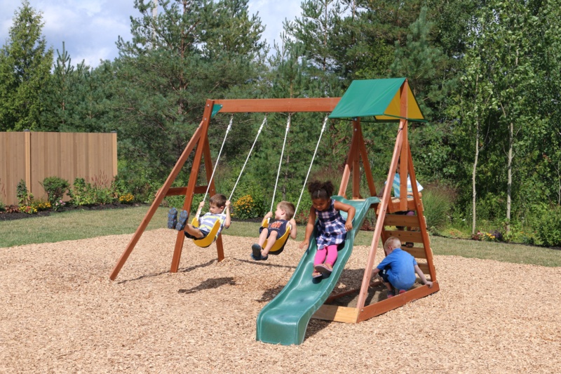 KidKraft Sunview II Wooden Outdoor Swing Set with Swings, Slide, Rock Wall and Glider