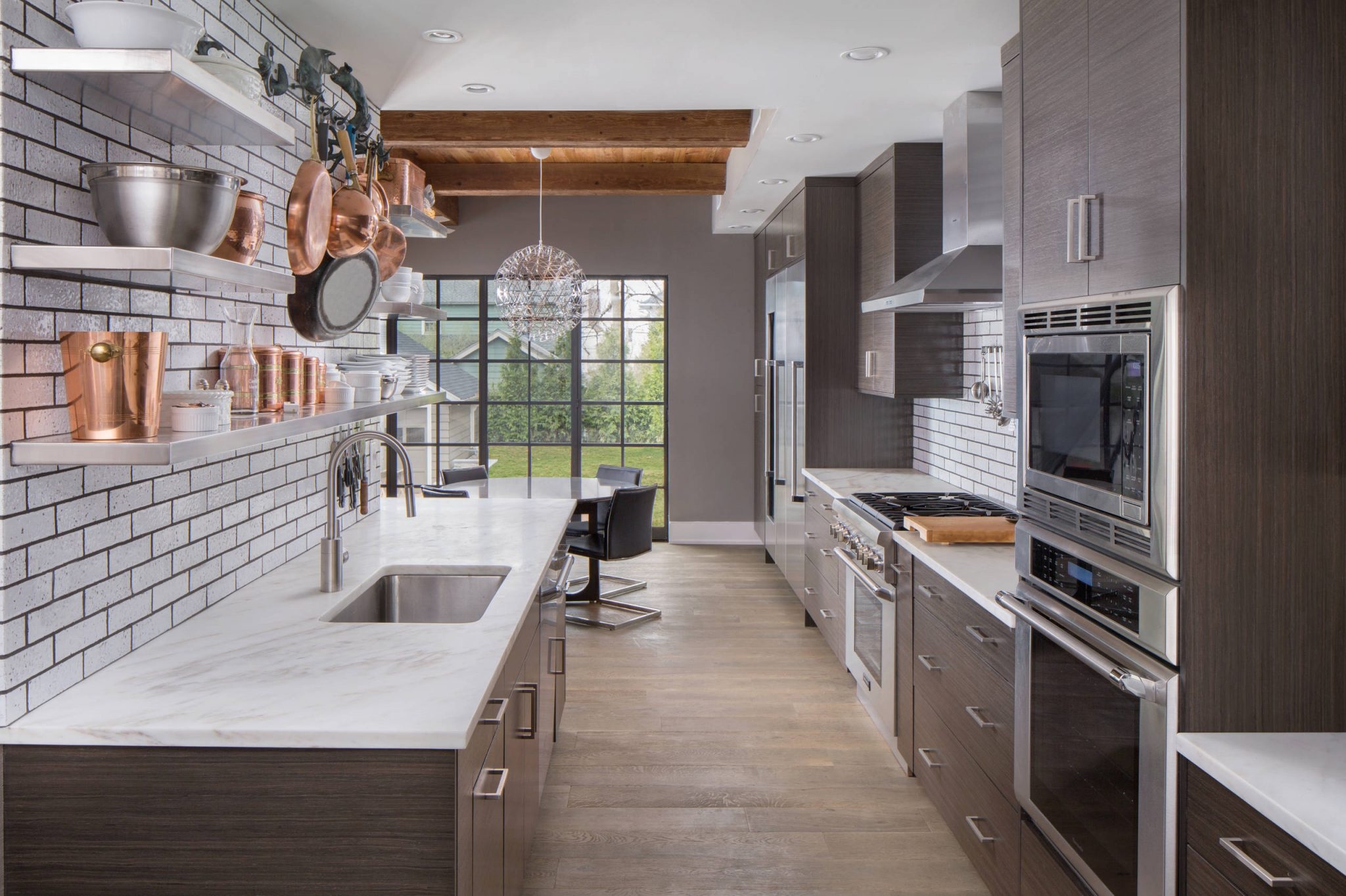 Kitchen with a cohesive copper set