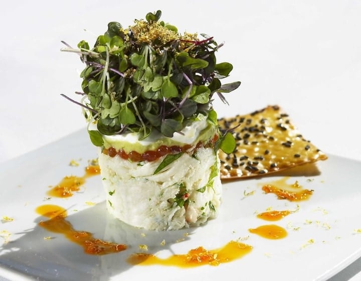 microgreens on top of a restaurant dish microgreens on top of a restaurant dish