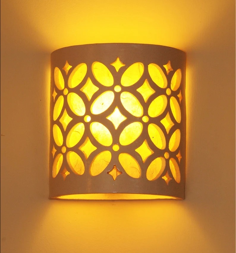 Patterned sconce cover