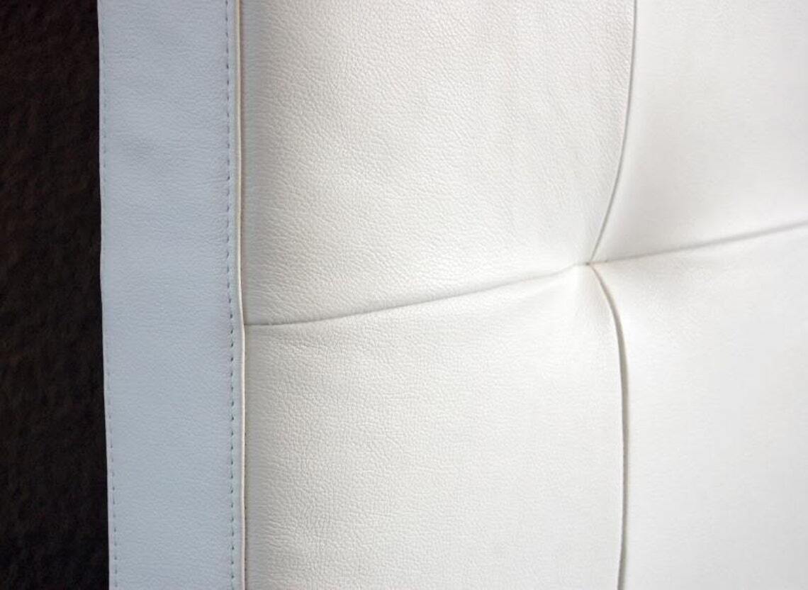 Simple white leather headboard