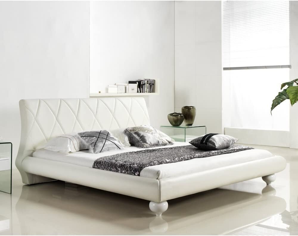 Tufted white leather headboard in a king size