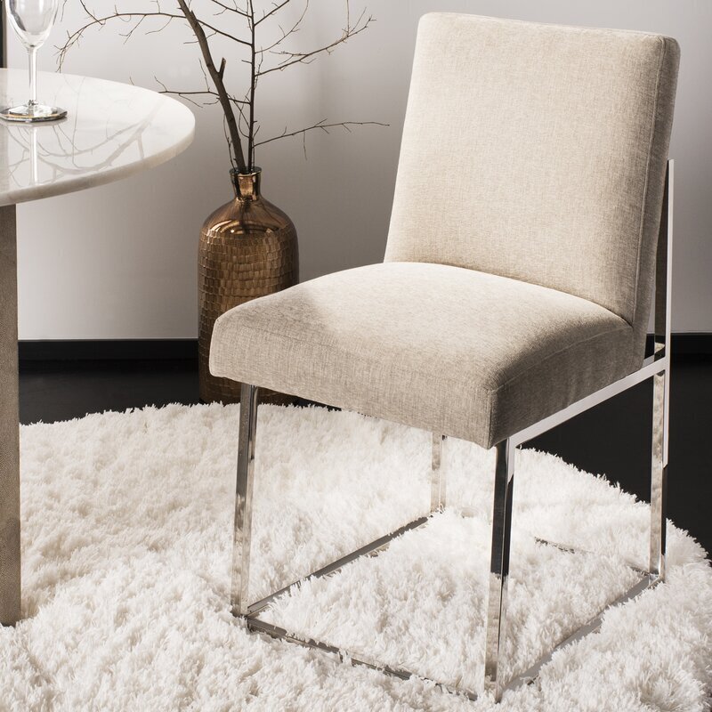 Upholstered stainless steel chair design