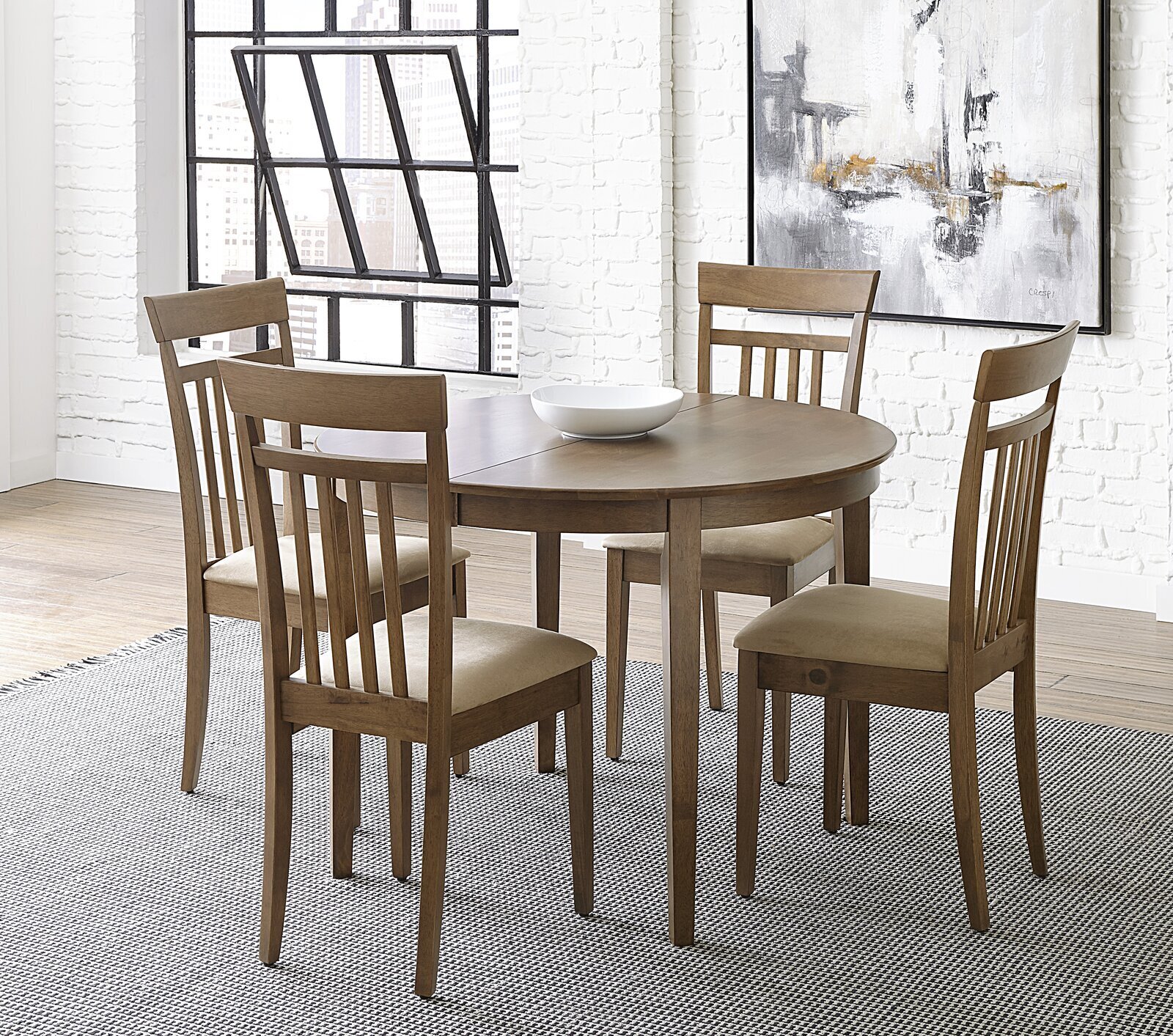 Versatile round dining table set with leaf