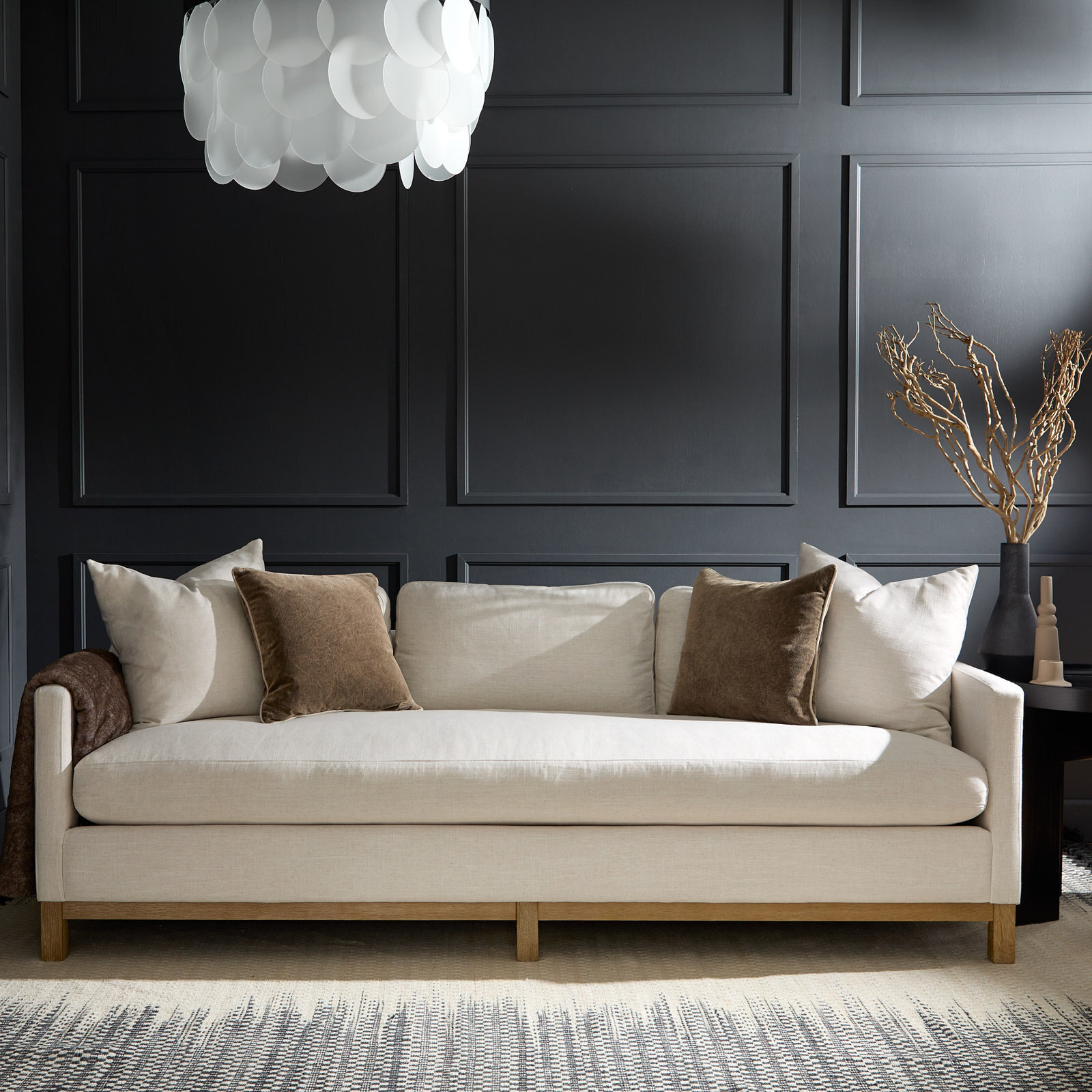 Versatile single cushion sofa