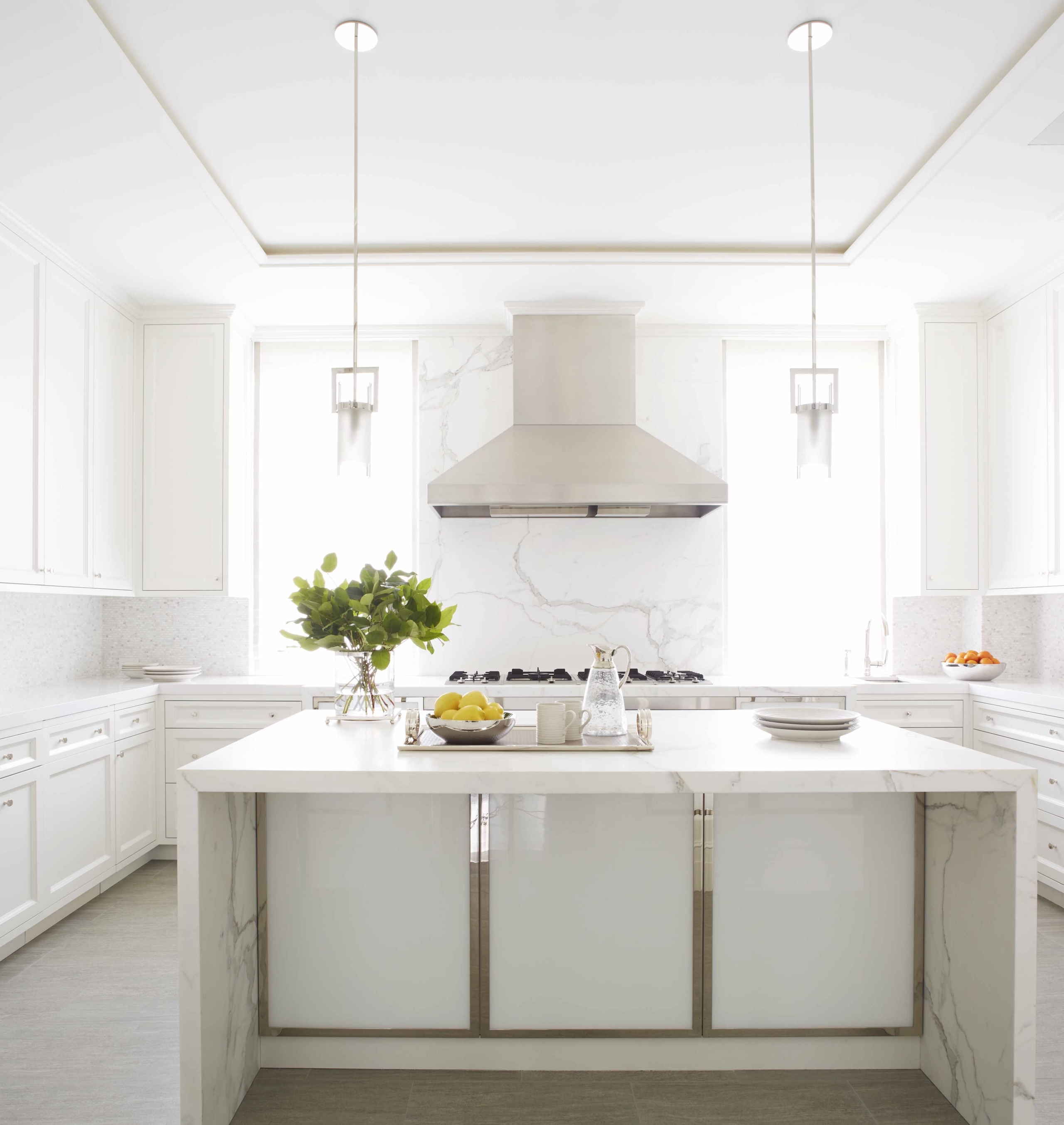 White kitchen with golden accents