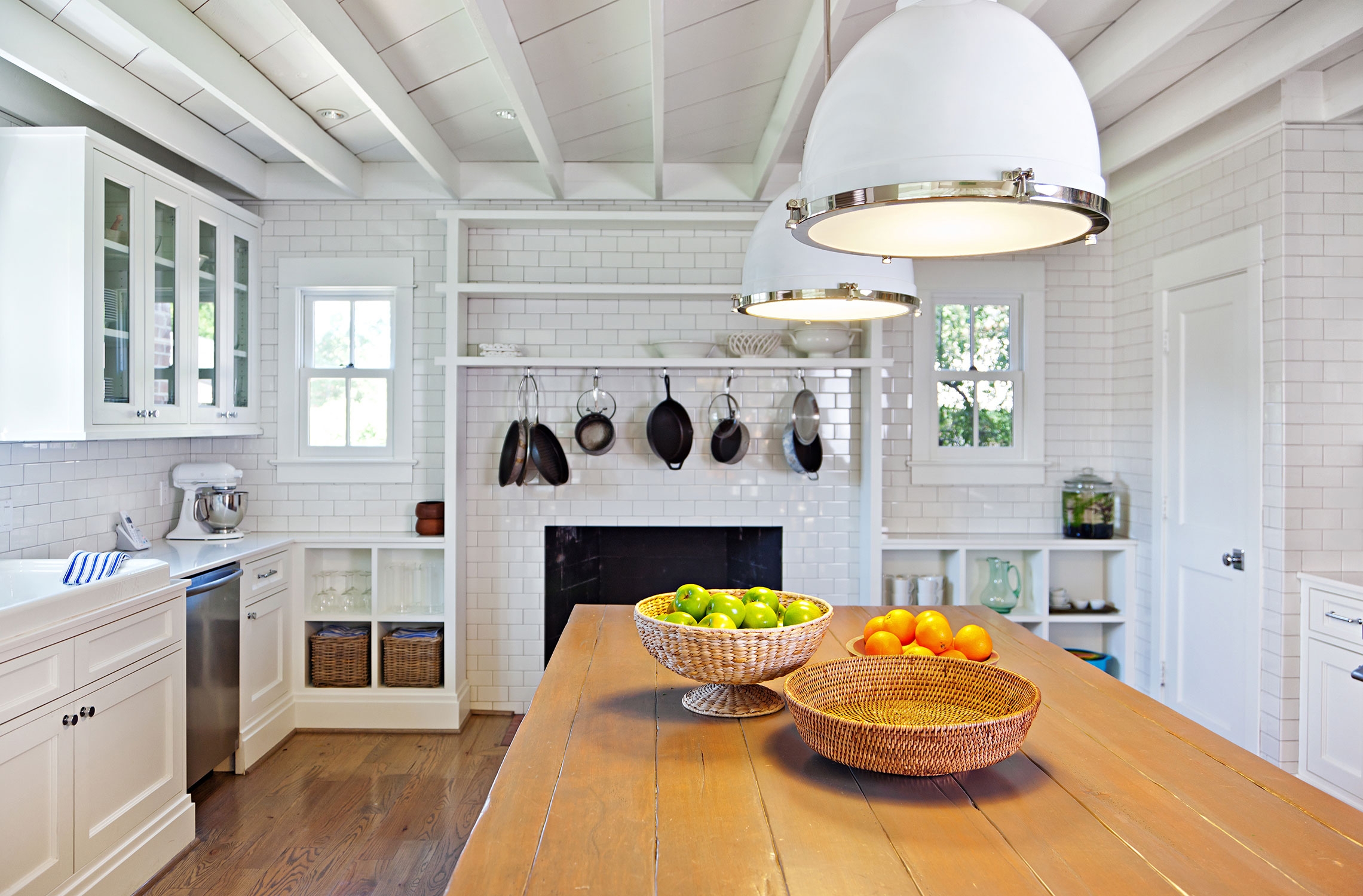 White kitchen with hanging pots