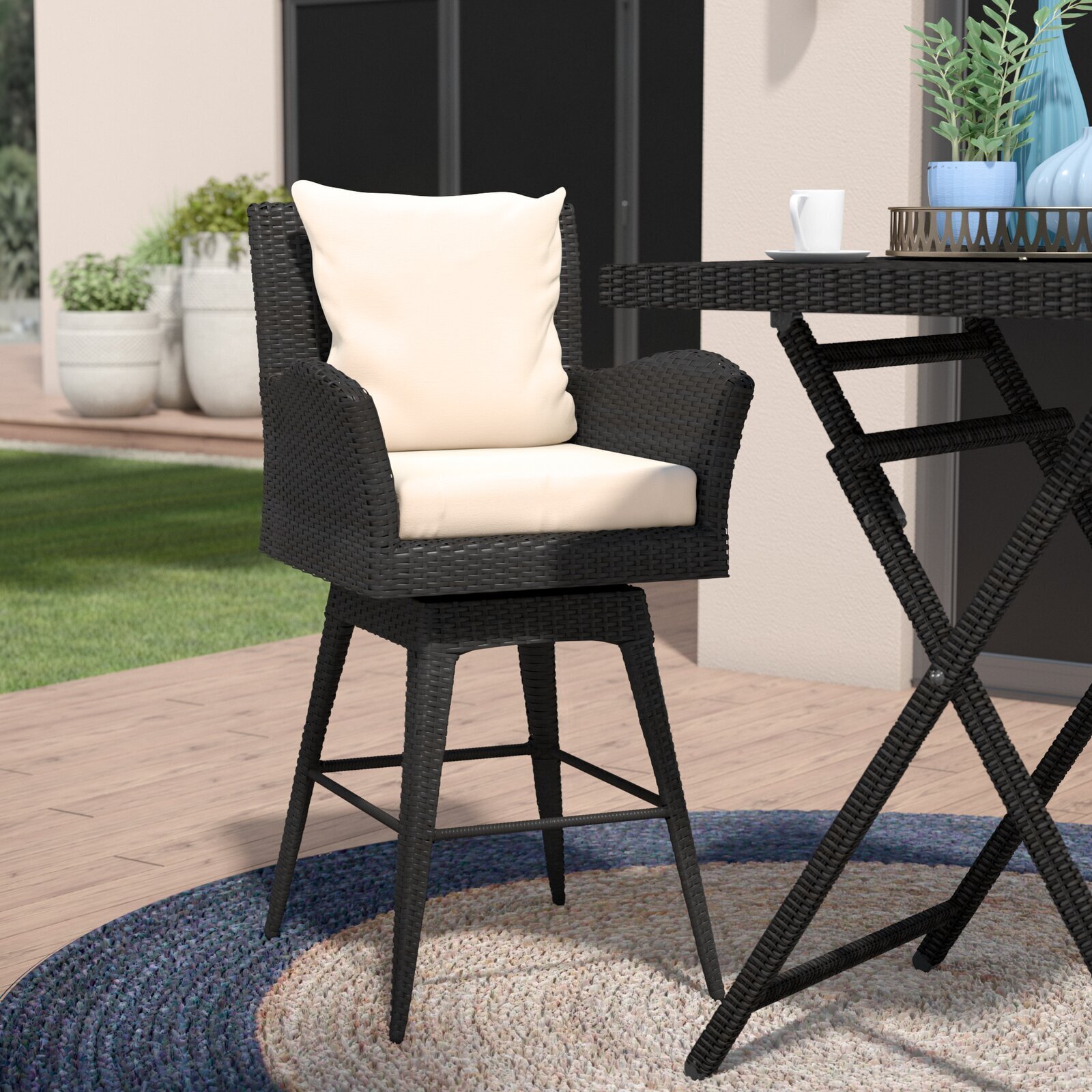Wicker outdoor swivel bar stool with arms