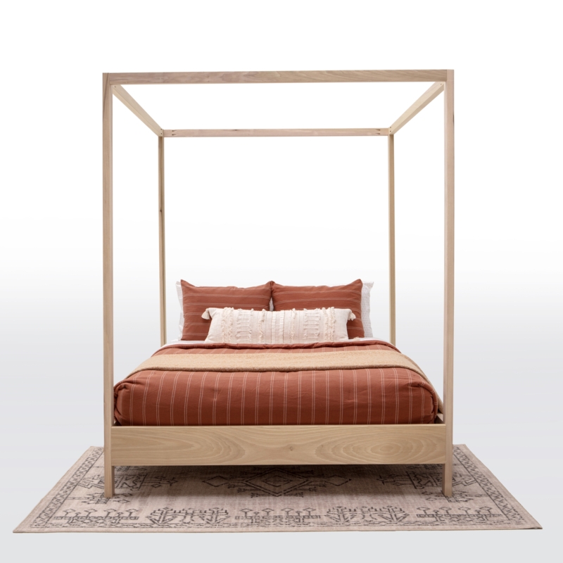 Elegant Canopy Bed with Customizable Finish