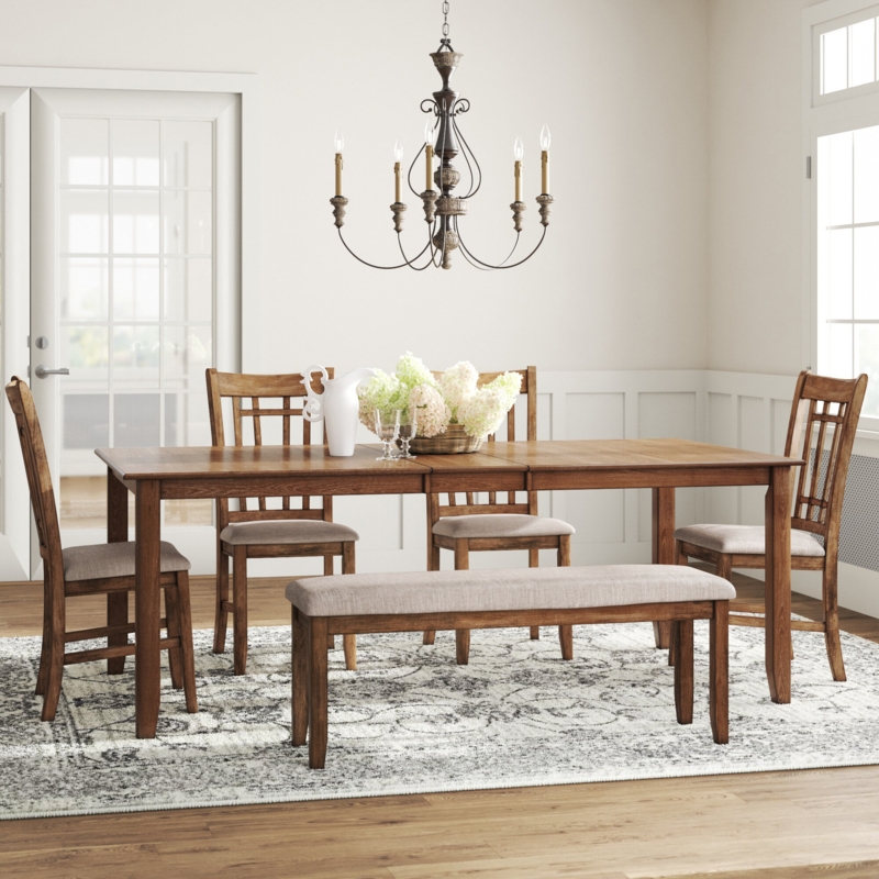 Compact Dining Table with Upholstered Chairs