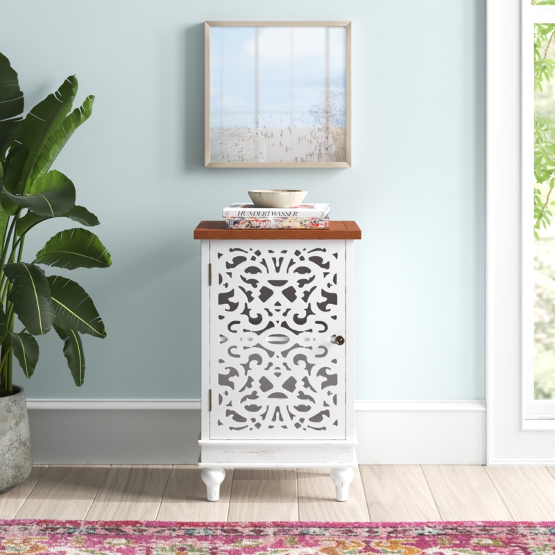 Distressed Accent Cabinet with Carved Design