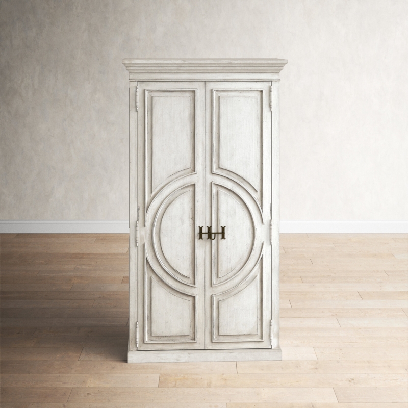 Stylish Focal Point Armoire with Circle Motif