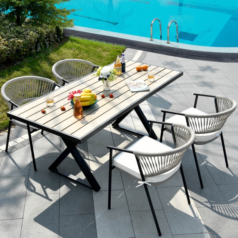 Aryanah 4 - Person Rectangular Outdoor Dining Set with Cushions