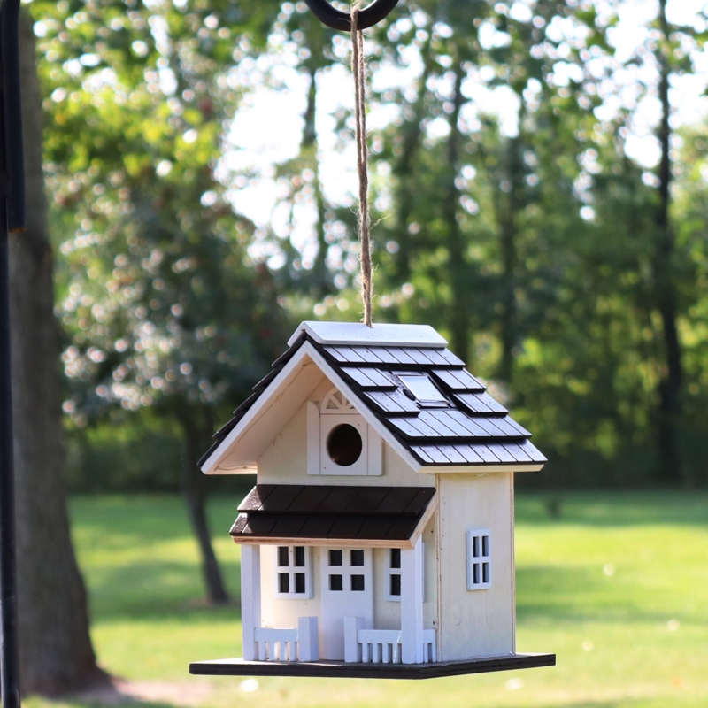 Manzie 9.25'' H x 7'' W x 7'' D Wall Mounted Weather Resistant Birdhouse
