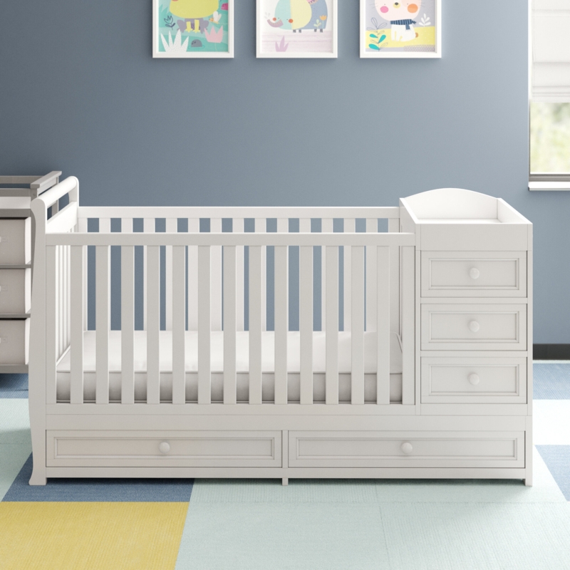 Small crib with changing table on sale