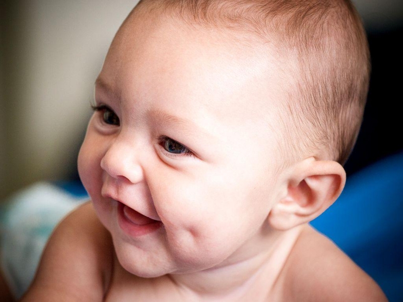 Adorable Smiling Baby Boy Close-Up Portrait