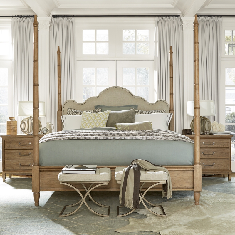 Elegant Upholstered Four-Poster Bed with Natural Wood
