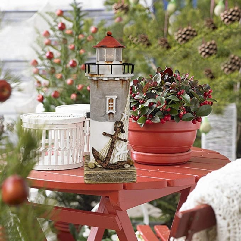 Handcrafted Wooden Lighthouse Decor on Outdoor Table