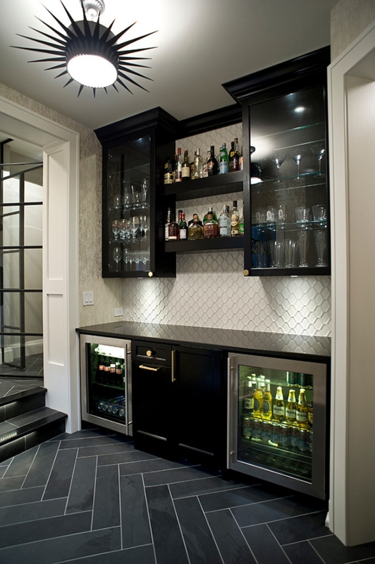 Modern Basement Bar with Black Cabinets and Glass Shelves