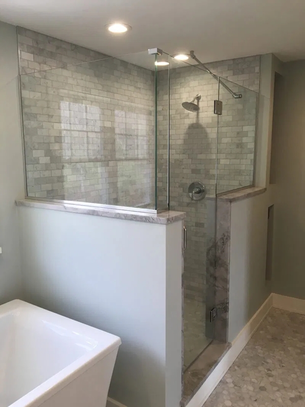 Modern Frameless Glass Shower with Half Wall Design