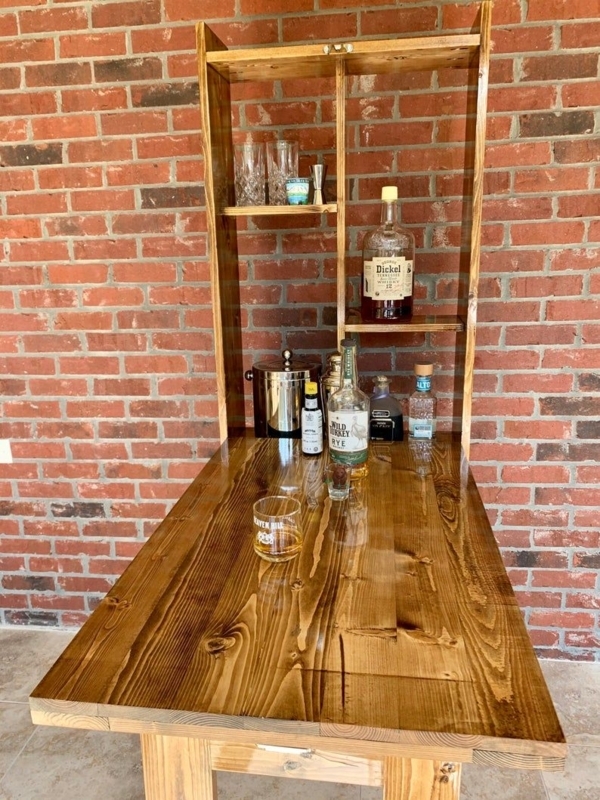Rustic Wooden Hanging Bar Cabinet with Exposed Brick