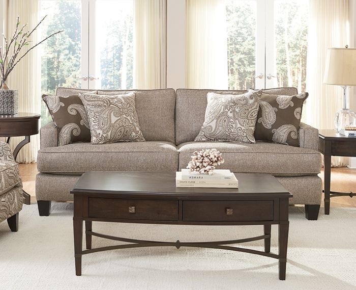 Elegant Taupe Couch with Dark Wood Furnishings
