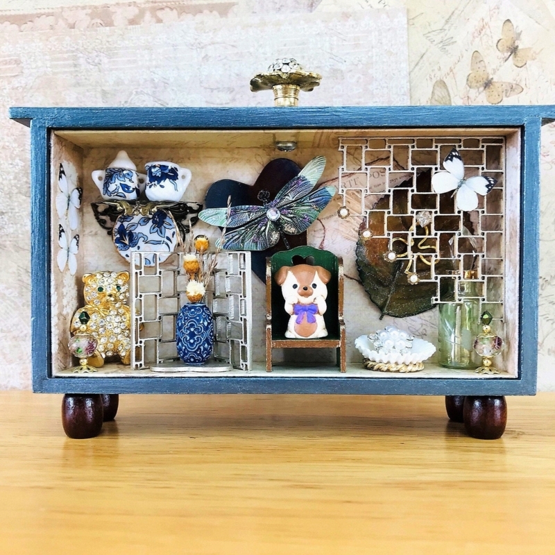 Whimsical Shadow Box Display with Miniature Artifacts