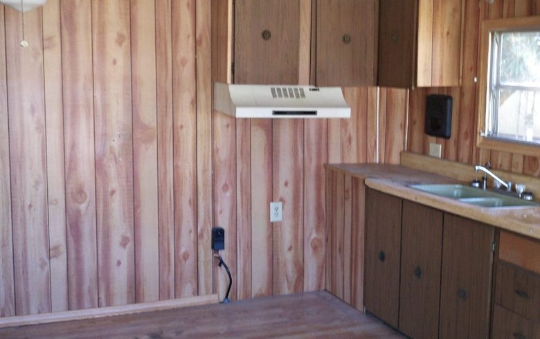 Rustic Wood Paneling in Mobile Home Kitchen