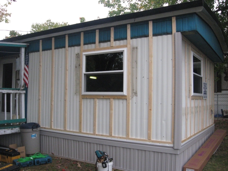Small Modern House with Durable Metal Siding