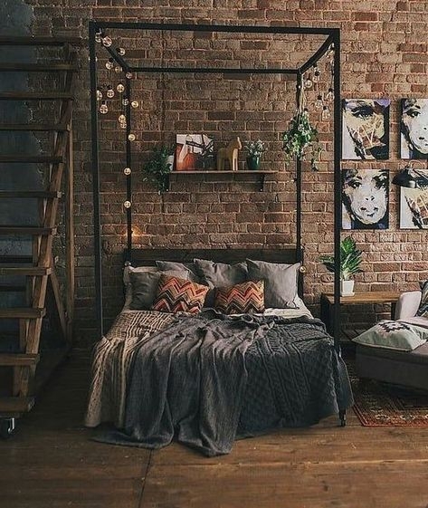 Cozy Industrial Bedroom with Exposed Brick and Metal Frame