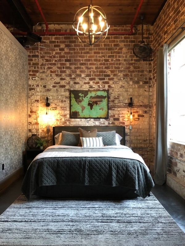 Modern Industrial Bedroom with Exposed Brick Walls