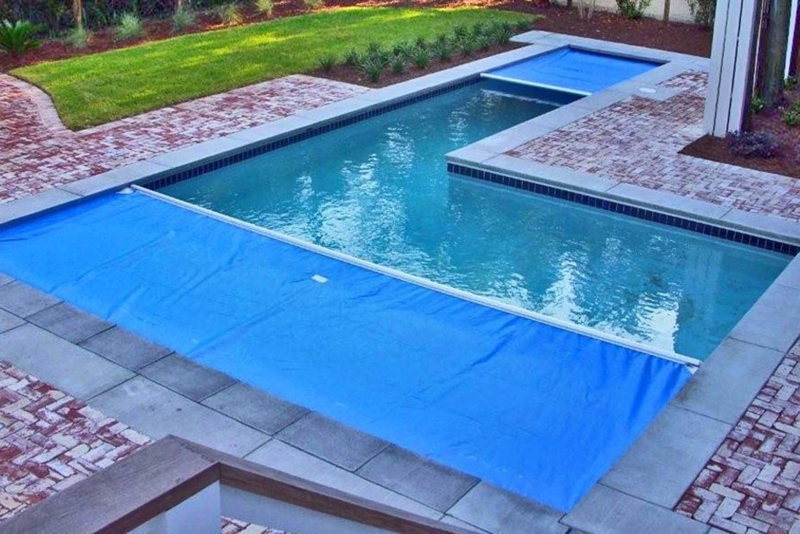 Modern Rectangular Pool with Protective Blue Covers