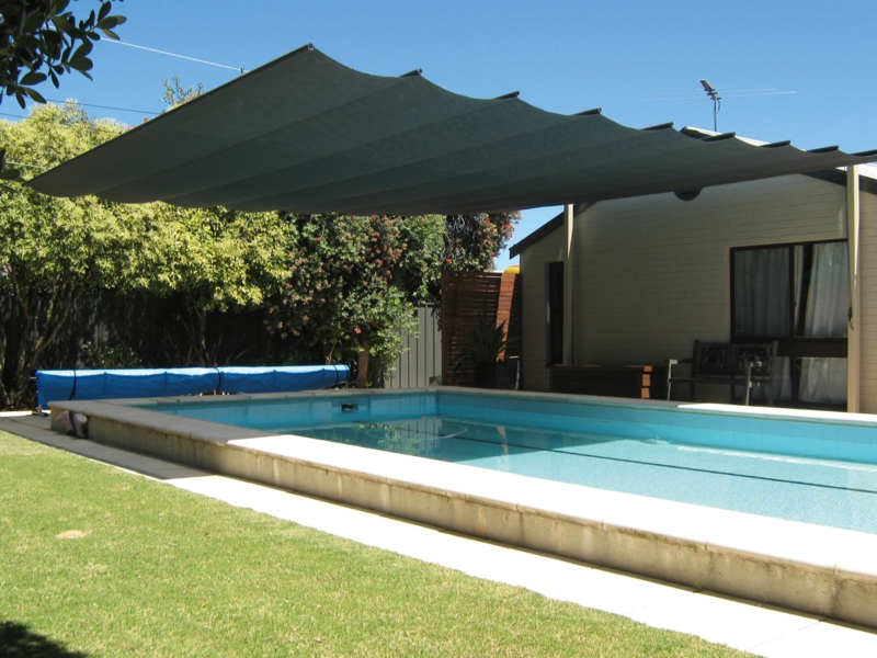 Modern Retractable Shade Over Inground Pool