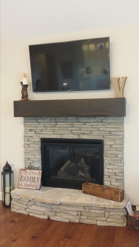 Custom Stone Fireplace Mantel with Hidden Storage